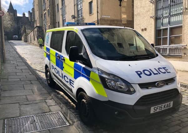 A Police Scotland van in Old Toolbooth Wynd this morning. Picture: Lisa Ferguson/TSPL