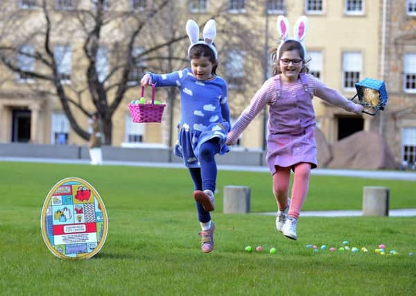 Sisters Mollie and Isla McNally are getting ready for a cracking Easter, joining the citys residents, workers and families on the hunt for ten special eggs hidden around the centre by Essential Edinburgh. Pic: Jon Savage.