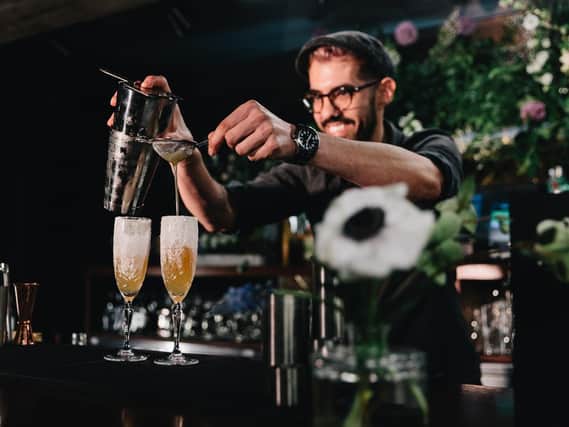 56 North gin bar prepare special cocktail to help support drive to save endangered Scottish plant.
