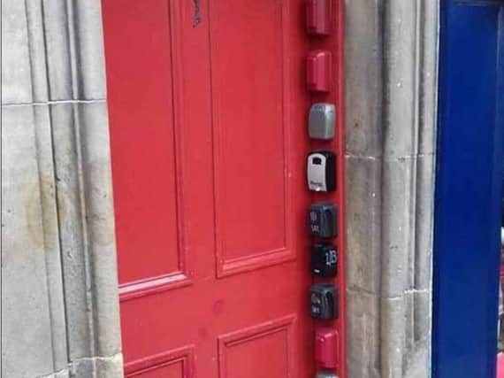 The ruling to remove key boxes from an Old Town tenement has been upheld
