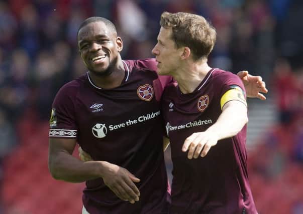 Uche Ikpeazu and Christophe Berra are all smiles after Hearts Hampden triumph over Inverness. Pic: SNS