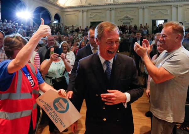 Nigel Farage us cheered by supporters at a Brexit party rally in Nottingham. Picture: SWNS