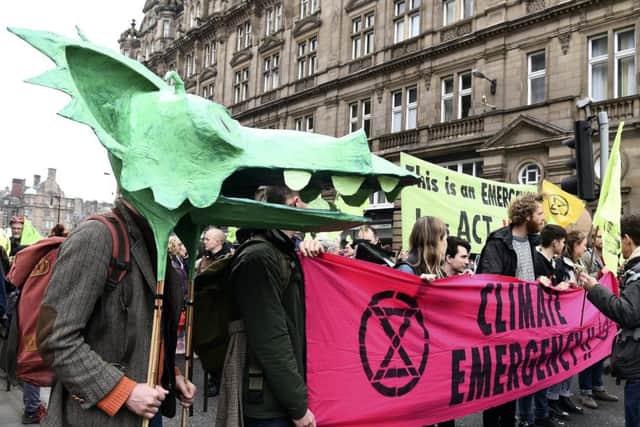 Extinction Rebellion campaigners bring North Bridge to a standstill. Picture: Lisa Ferguson