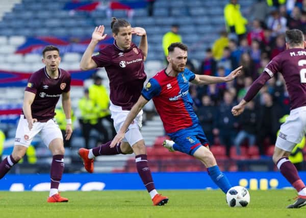 Peter Haring (centre left) is a doubt for the match against Rangers. Picture: SNS