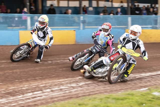 Heat 3: Josh Pickering goes between Matthew Wethers and Lasse Bjerre. Picture: Ron MacNeill