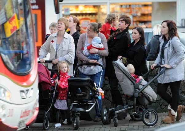 A group of mothers pictured waiting in St Johns Road, Corstorphine. Pic: Ian Rutherford