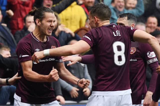 Peter Haring (left) has been in fine form for Hearts this season - but his team-mates need to step up in his absence. Picture: SNS Group