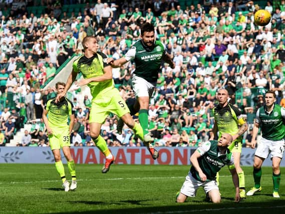 Celtic defender Jozo Simunovic has a late header saved by Ofir Marciano.