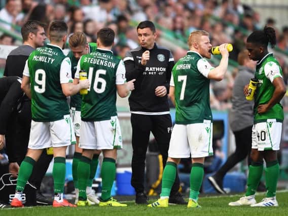 Paul Heckingbottom issues instructions to his players during a break in play.