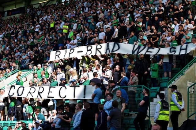 Hibs fans paid tribute to murdered fan Bradley Welsh with a  minute's applause at Easter Road on Sunday, while some young supporters ran onto the pitch . Picture: SNS
