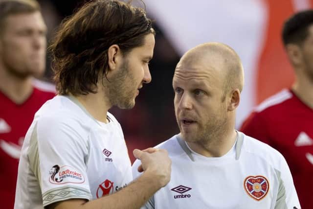 Peter Haring, left, and Steven Naismith, right, are key men at Hearts. Pic: SNS