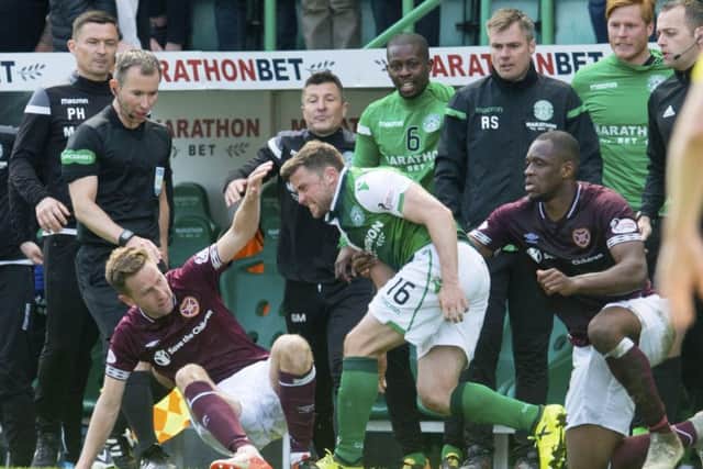 Hearts striker Steven MacLean and Hibs defender Lewis Stevenson were booked after this flashpoint