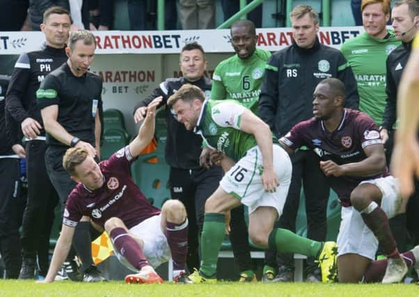 Hearts striker Steven MacLean and Hibs defender Lewis Stevenson were booked after this flashpoint