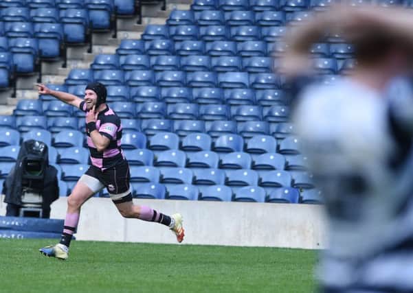 Ayr's Frazier Climo celebrates kicking the winning penalty. Pic: Neil Hanna