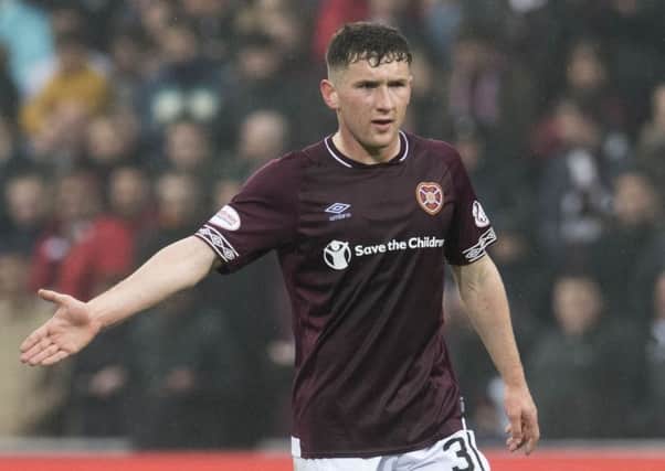 Bobby Burns is filling in for Hearts at left-back due to injuries to Ben Garuccio and Demetri Mitchell and is enjoying the experience