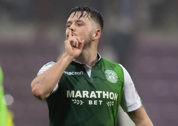 Marc McNulty celebrates at full time in the last Edinburgh derby at Tynecastle
