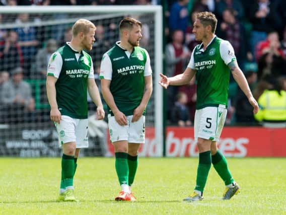 Marc McNulty, centre, missed a spot-kick for Hibs.