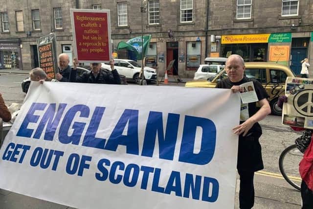 SNP delegates inside the EICC condemned the banner displayed outside