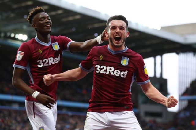 John McGinn celebrates a goal against Middlesbrough with Tammy Abraham in March. Picture: Getty Images