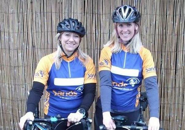 Emma Steele and Helen Jackson are cycling for Sands