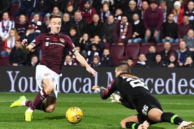 Hearts striker Steven MacLean fires his side in front during the last meeting at Tynecastle - only for the goal to be chopped off. Picture: SNS