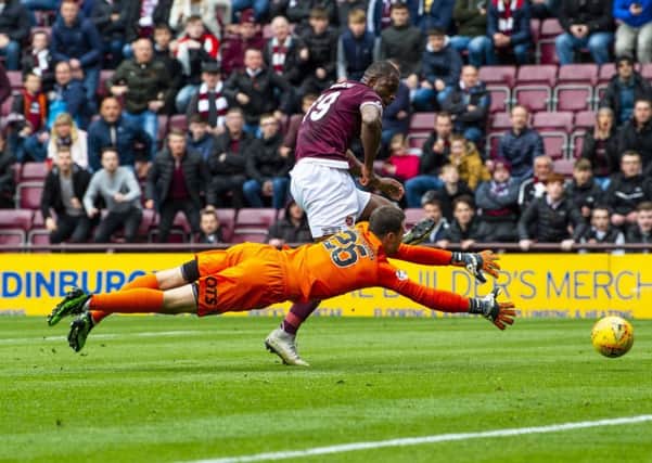 Hearts Uche Ikpeazu misses a chance in the second half as Kilmarnock's Daniel Bachmann attempts to save. Pic: SNS