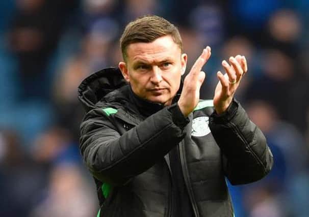 Paul Heckingbottom applauds the players at full-time.