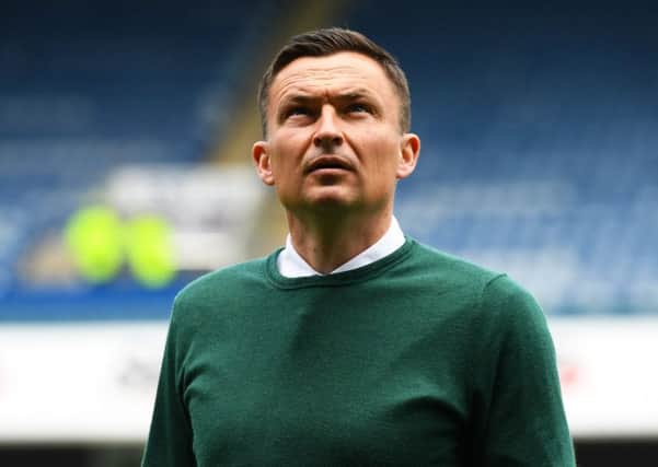 Paul Heckingbottom wants to explore the best route for Hibs' young players to progress. Pic: SNS