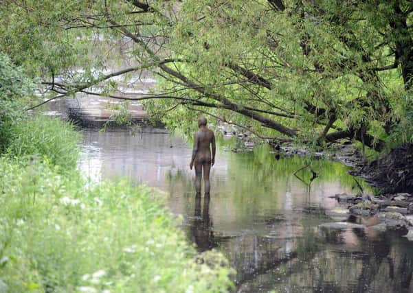 Antony Gormley's figures in the Water of Leith 
near Newhaven Road , Bonnington