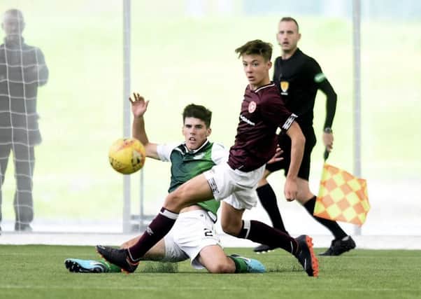 Hearts plan to play in the SPFLs Reserve League next season so youngsters such as Aaron Hickey, above, keep developing. Pic: TSPL