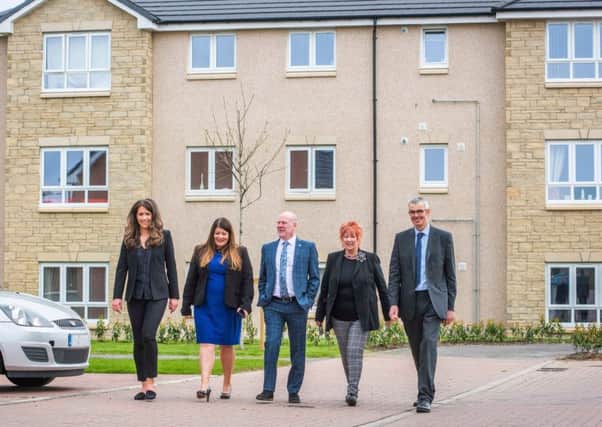 (left to right) Abby Kelman, Land Negotiator for Taylor Wimpey East Scotland, Pauline Mills, Land and Planning Director for Taylor Wimpey East Scotland, Kevin Stewart, Minister for Local Government, Housing and Planning, Christine Grahame, MSP and Andrew Noble, Chief Executive of Melville Housing Association.Picture Copyright Chris Watt