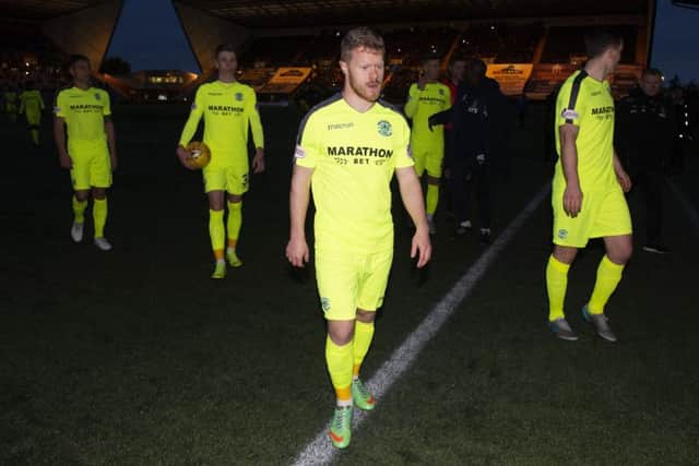 Daryl Horgan and team-mates walk off following a second-half powercut at Rugby Park in December