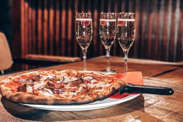 Pizze, prosecco and puppies this Sunday at Revolution.