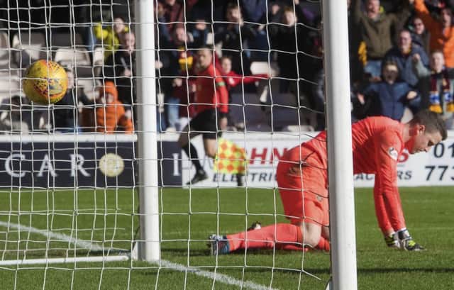Hearts goalkeeper Colin Doyle suffered for his mistake at Fir Park but returned to the first team in the 2-1 defeat at Aberdeen on Friday
