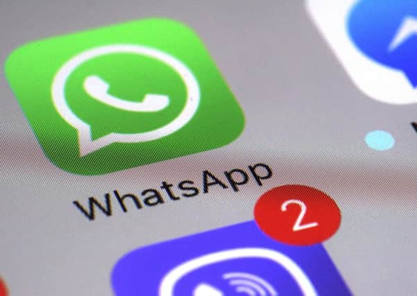 WhatsApp says a vulnerability in the popular communications app let mobile phones be infected with sophisticated spyware with a missed in-app call alone. (AP Photo/Patrick Sison, File)