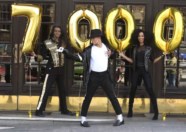 Thriller Live cast celebrate the shows 7000th performance -

Britt Quentin,  

Kieran Alleyne and 

Ina Seidou