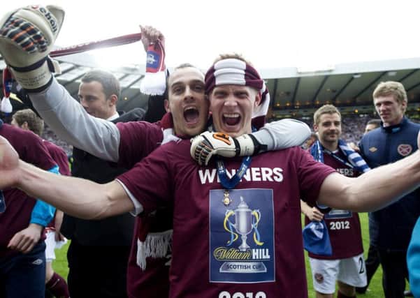 Jamie MacDonald and Andy Driver celebrate Hearts' Scottish Cup final victory over Hibs in 2012