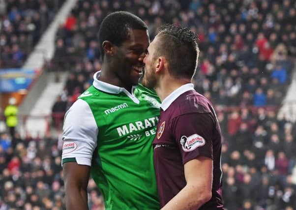 Hibs midfielder Marvin Bartley, left, has signed a pre-contract deal with Livingston. Picture: SNS