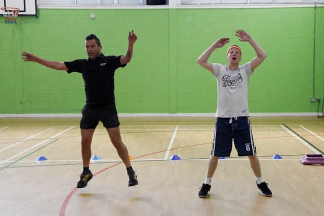 Andy Shipley doing the police fitness course at Edinburgh college with lecturer Rick Weightman