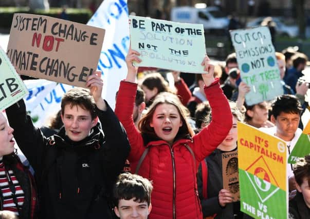 Children protest in Glasgow's George Square. Pic: John Devlin