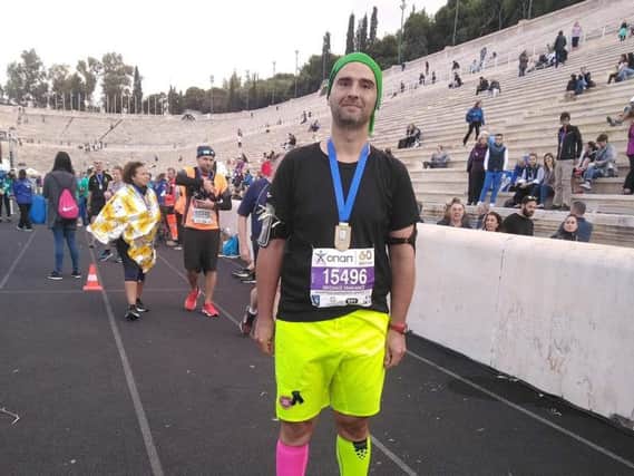 Nikos in Hearts shorts after a previous run