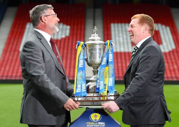 Hearts manager Craig Levein shares a joke with Celtic counterpart Neil Lennon ahead of tomorrow's final
