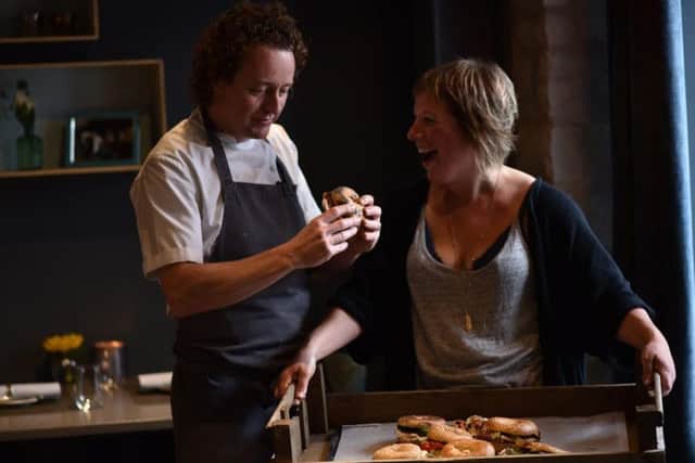 Chef Tom Kitchin tries Larah's 100 per cent Montreal-style bagels.