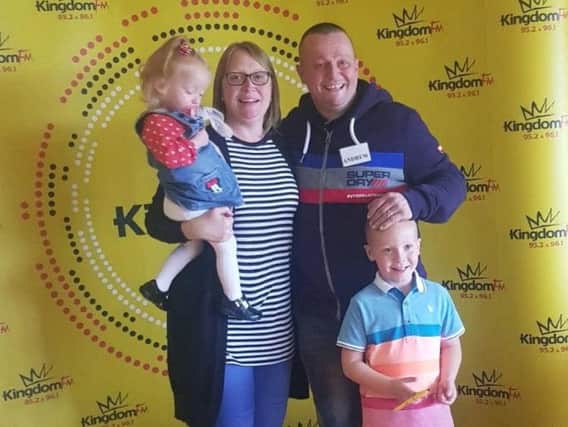 Arlene Keir and Andrew Hutchison, with their children Kai and Ava. Picture: SWNS