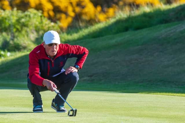 Mortonhall's Duncan Hamilton lines up up a putt against Stewart's Melville FP. Picture: Ian Georgeson