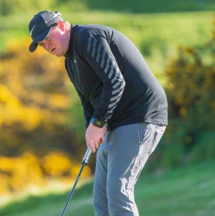 Benn McLeod sends a putt towards the hole for newcomers Dirleton Castle. Picture: Ian Georgeson