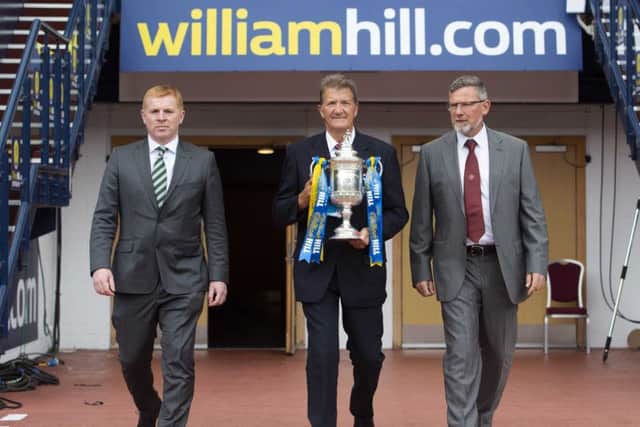 Hearts boss Craig Levein, right, and Celtic manager Neil Lennon will go head to head once more. Picture: SNS