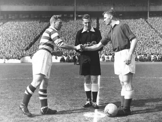The Hearts and Celtic captains shaking hands in 1956.
