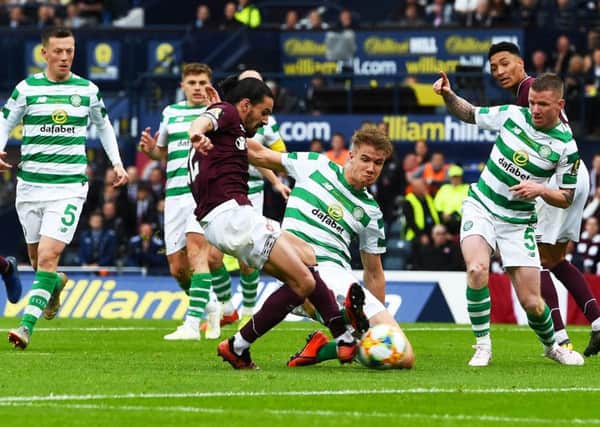 Hearts midfielder Ryan Edwards scores to put Hearts ahead against Celtic