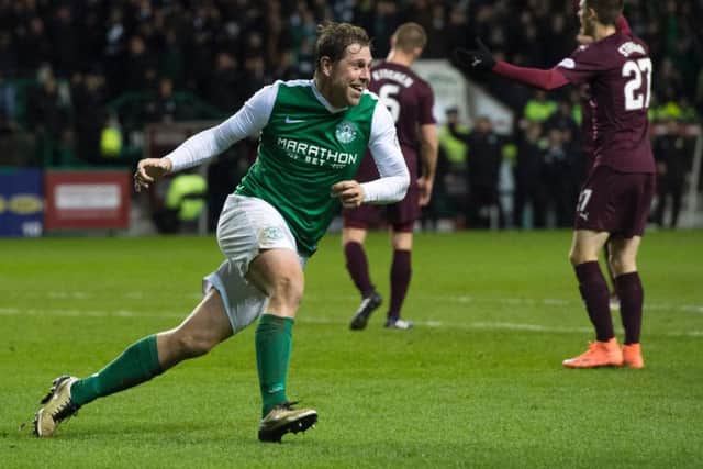 Holt wheels away after scoring against Hearts in the Scottish Cup